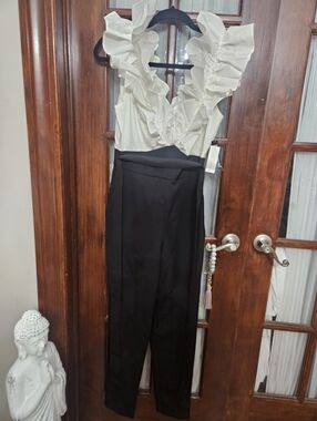 New York & Company Black and Ivory Ruffle V-Neck Jumpsuit